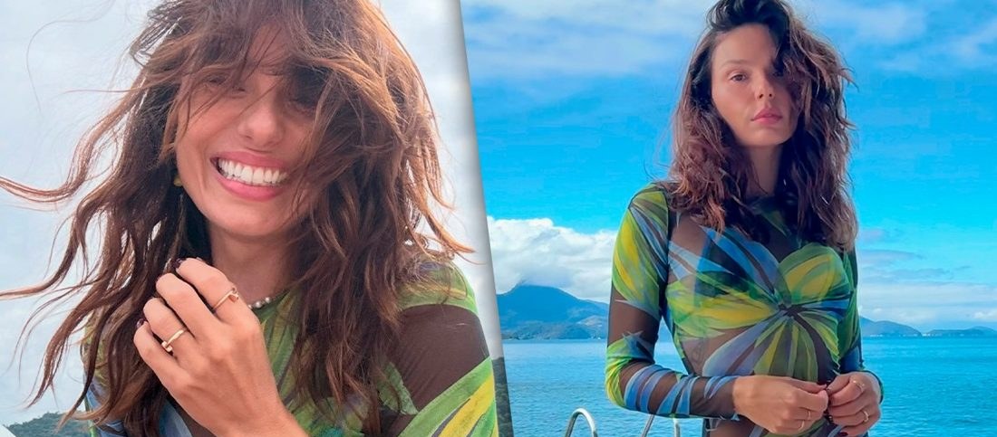 Isis Valverde arrasa em vestido transparente à beira-mar e celebra momento com o filho Rael
