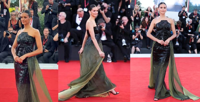 Nina Dobrev tem saia‑justa e é socorrida por segurança no tapete vermelho da estreia mundial de "Ink" no Festival de Veneza