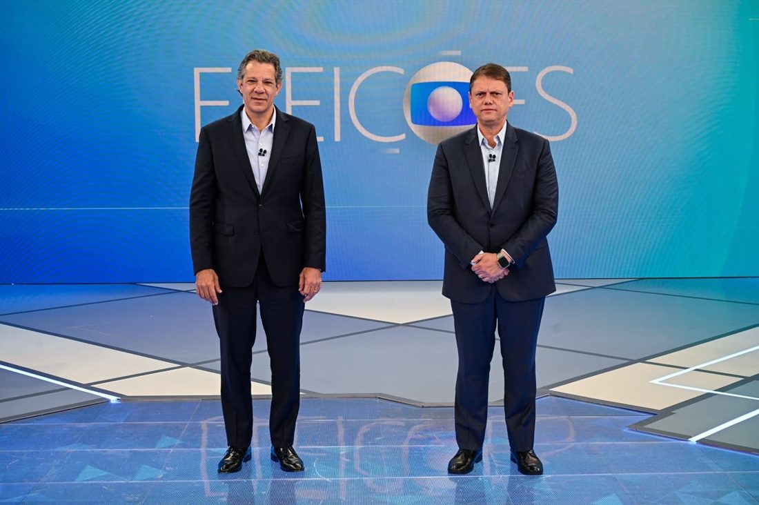 Tarcísio de Freitas e Fernando Haddad protagonizam debate nacionalizado em São Paulo com acusações de infiltração do PCC e do Comando Vermelho, além de críticas aos governos Lula e Bolsonaro